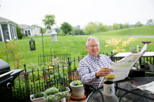 Resident Hardin Marion Reading Newspaper