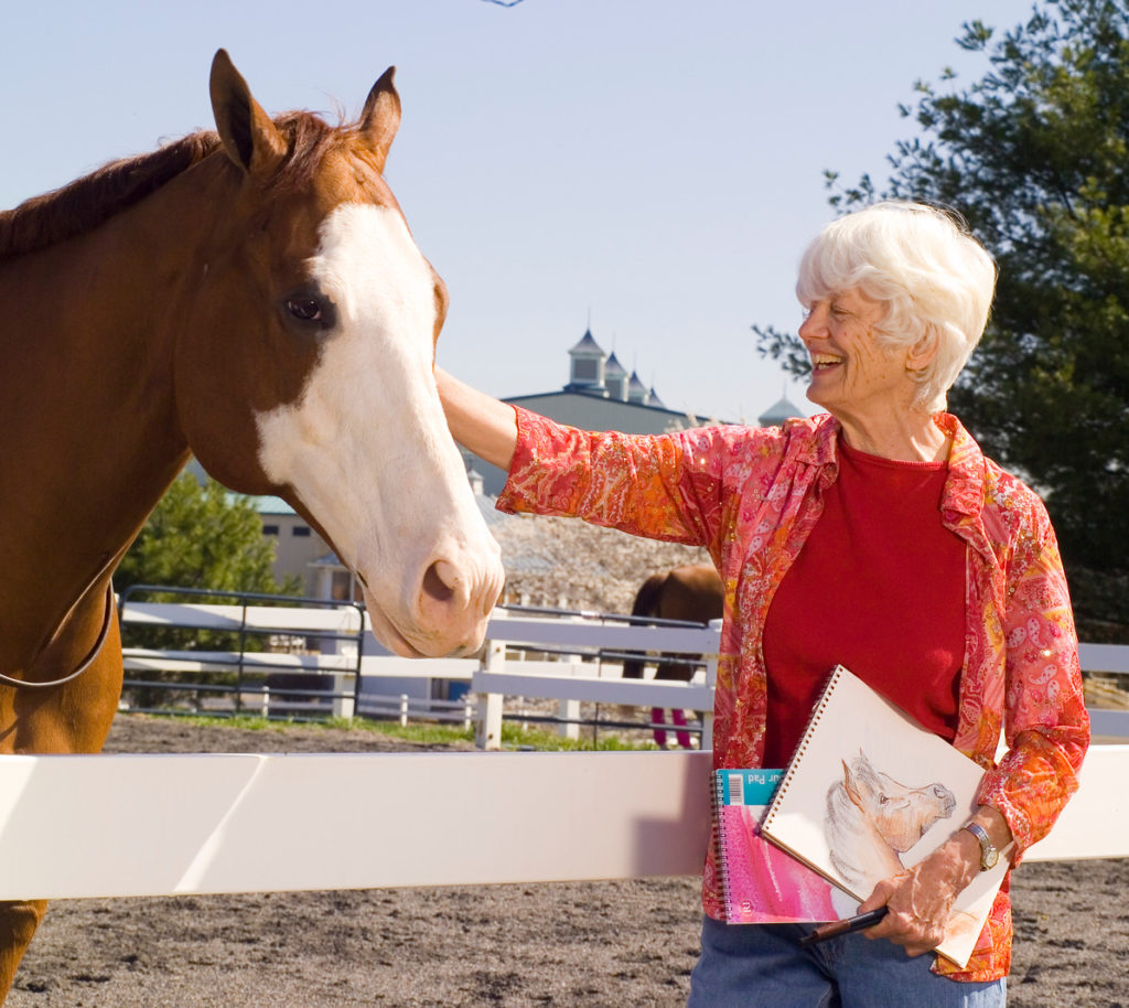 woman artist with horse