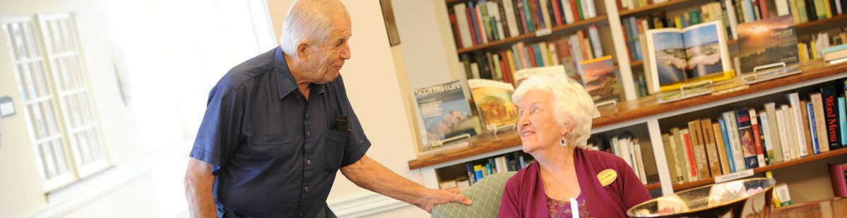 Couple in library conversing
