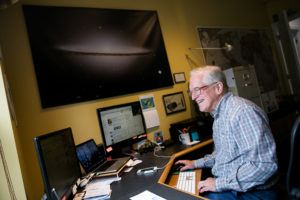 man on computer