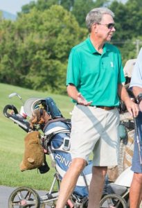 man named john golfing