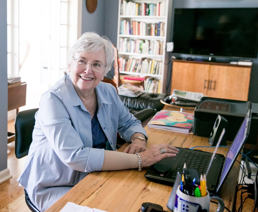 woman at computer in apt