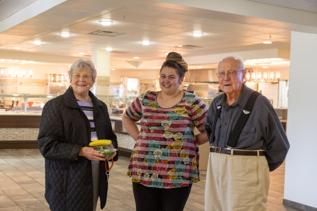younger Woman with older man and woman