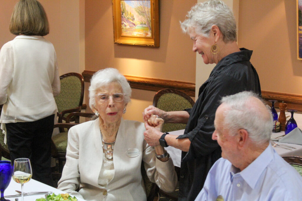 two diners embrace