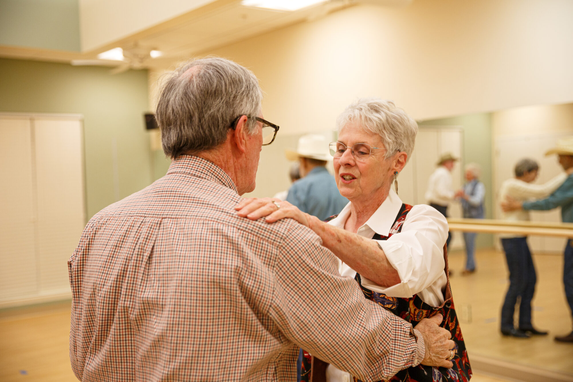 Kendal couple dancing together.