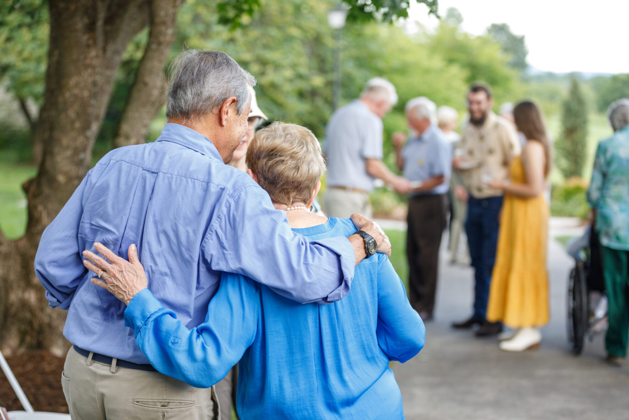 senior couple embrace at Life Plan Community anniversary